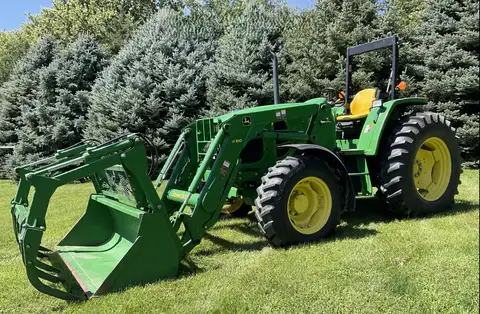 2010 John Deere 6115D MFWD Tractor with Grapple Loader